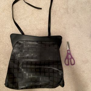 leather cross-body purse by Hester Van Eeghan